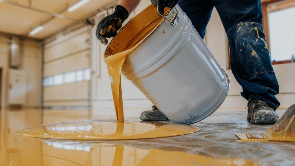 pouring paint in the floor