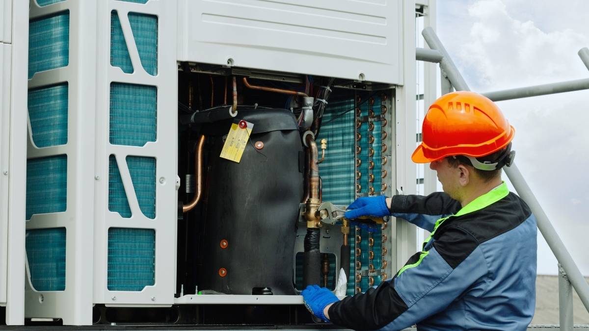 worker doing a hvac cleaning